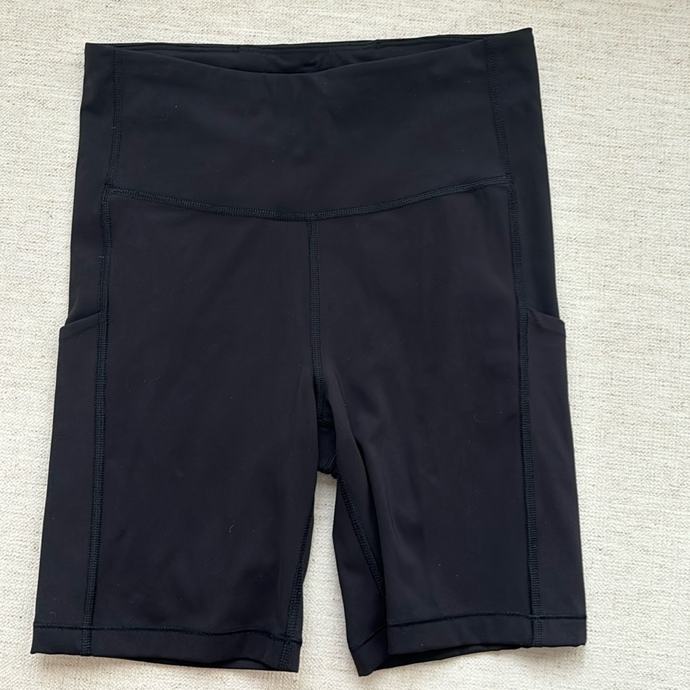 Athleta Ultimate Stash Pocket 7” Shorts. Black. Size S. New. Sleek!